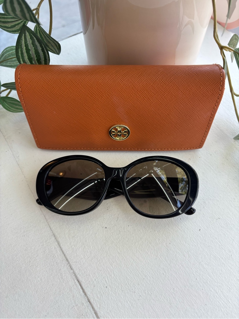 Tory Burch Black Oval Sunglasses with Orange Logo Case